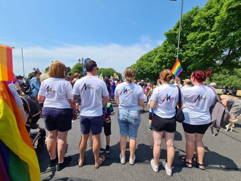Our Mexa team lined up with their Pride tshirts on (Mexa Solutions written in Rainbow)