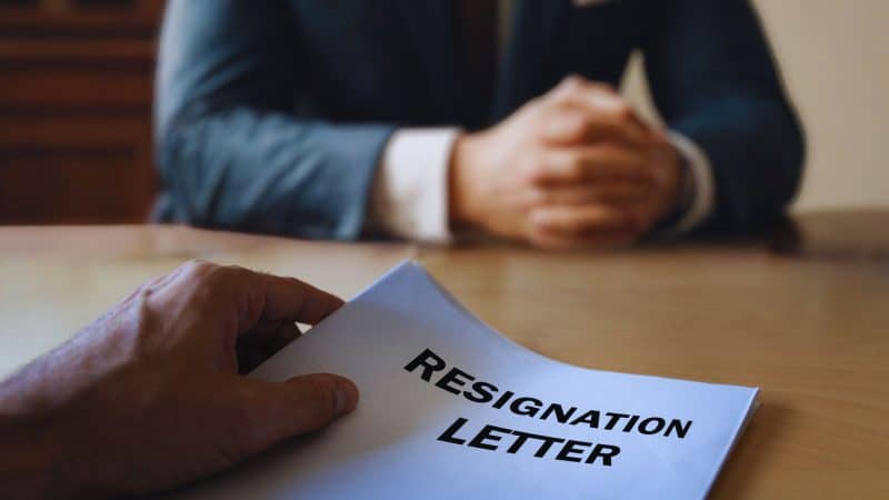 a person handing in their resignation
