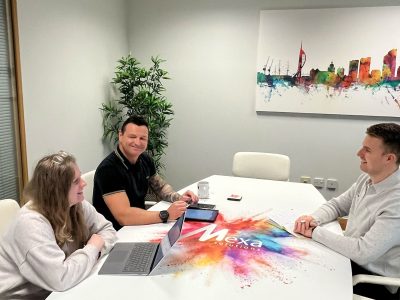 mexa team sat round the boardroom table