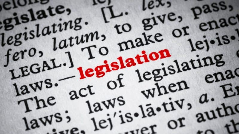 a page in a book with the word legislation in red