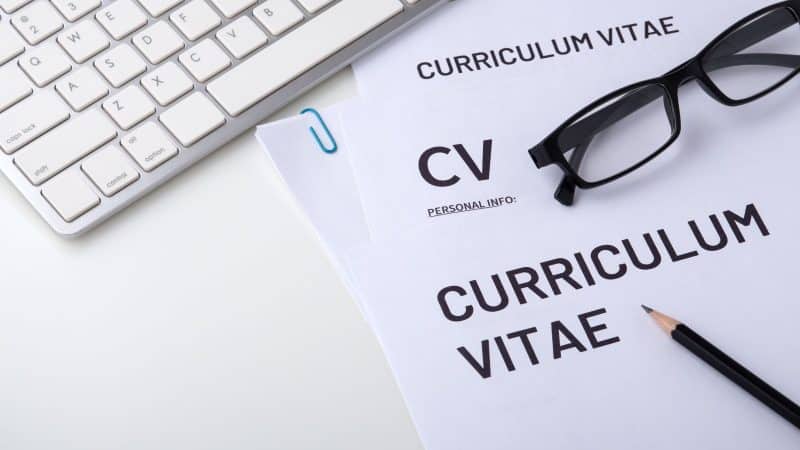 paper form cv on a desk 